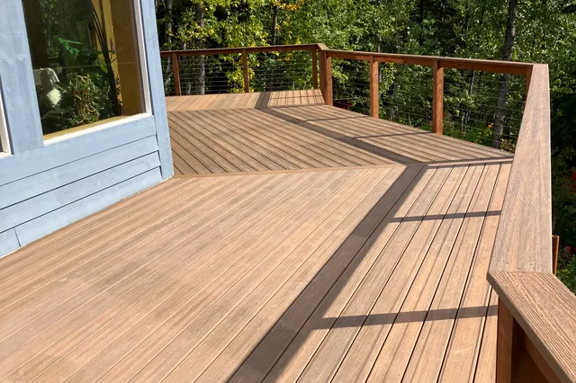 Detail of Grill 724 sq ft Trex deck with cable rails