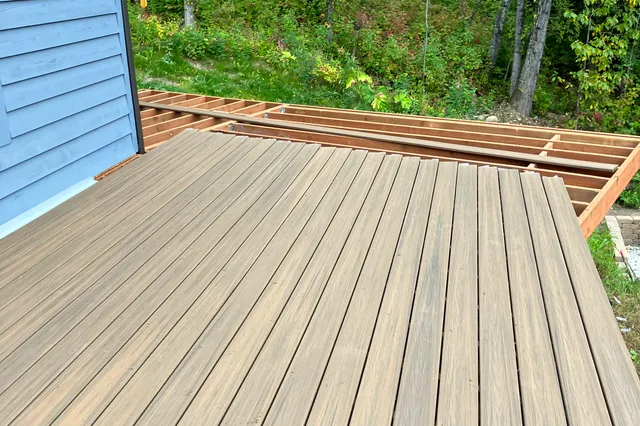 Detail of Grill 724 sq ft Trex deck with cable rails