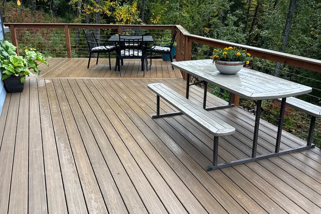 Detail of Grill 724 sq ft Trex deck with cable rails
