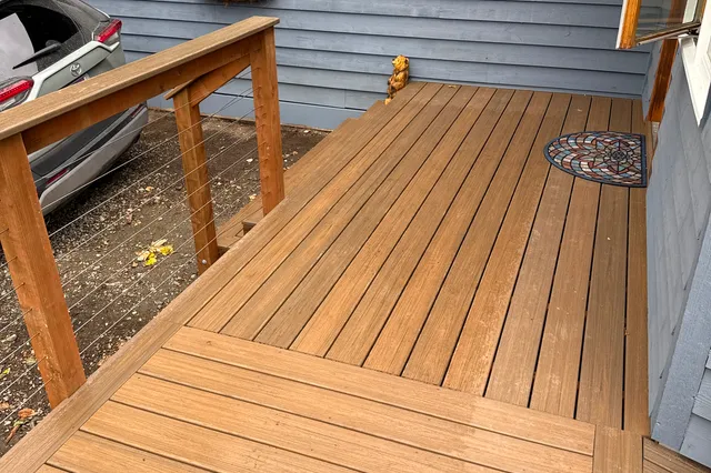 Detail of Grill 724 sq ft Trex deck with cable rails