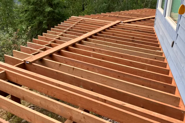 Detail of Grill 724 sq ft Trex deck with cable rails