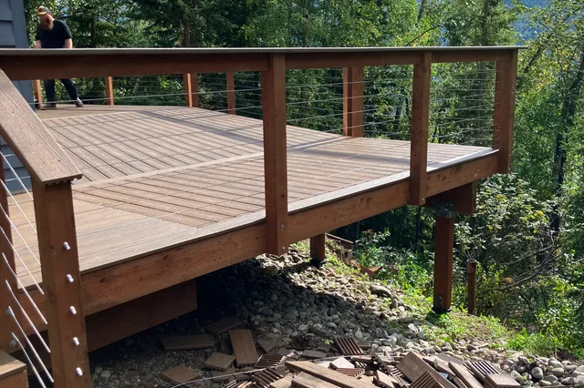 Detail of Grill 724 sq ft Trex deck with cable rails
