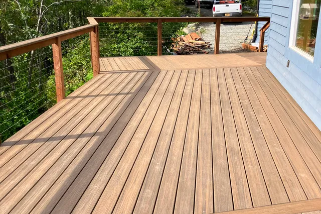 Detail of Grill 724 sq ft Trex deck with cable rails