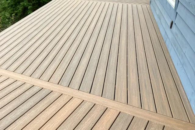 Detail of Grill 724 sq ft Trex deck with cable rails