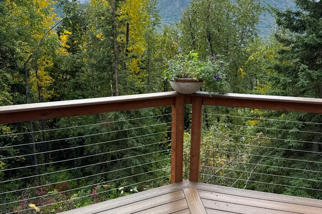 Detail of Grill 724 sq ft Trex deck with cable rails