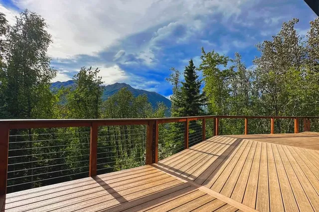 Detail of Grill 724 sq ft Trex deck with cable rails